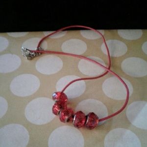 5 red euro beads with red cord necklace